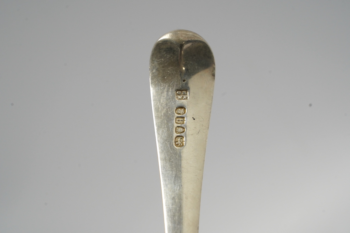 A George III silver Old English pattern basting/straining spoon, Smith & Fearn, London, 1791, 29.6cm, weight 136 grams. Condition - fair